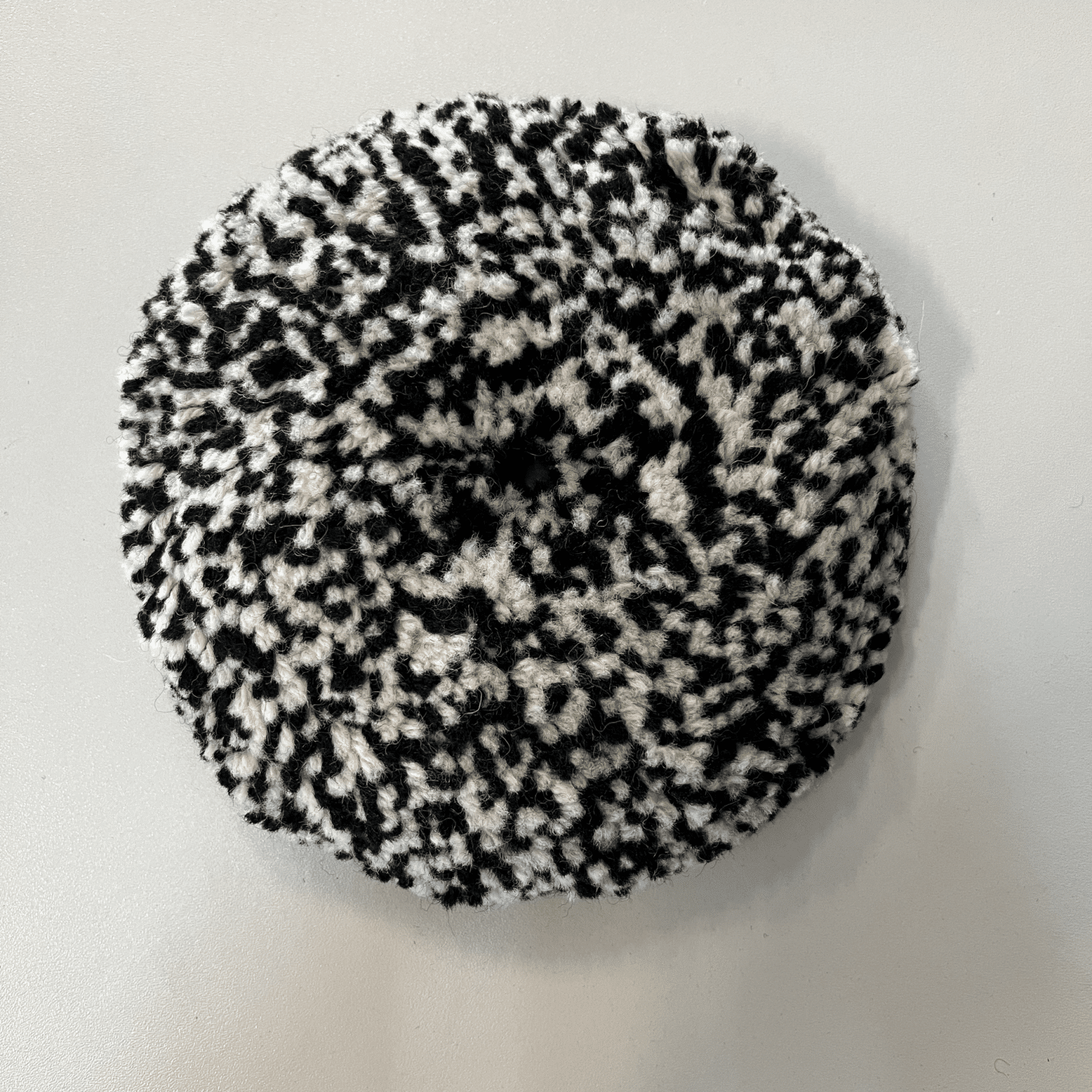 Pad de polissage Wox en laine naturelle, vu du côté des fibres